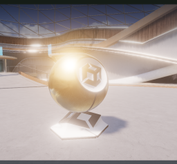 Terminal v1: a wide view of the imported scene with a bright highlight on the gold material sphere