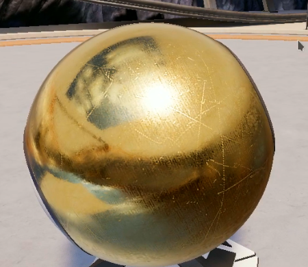 Terminal v2: a close-up of the gold sphere showing surface scratches and environmental reflections